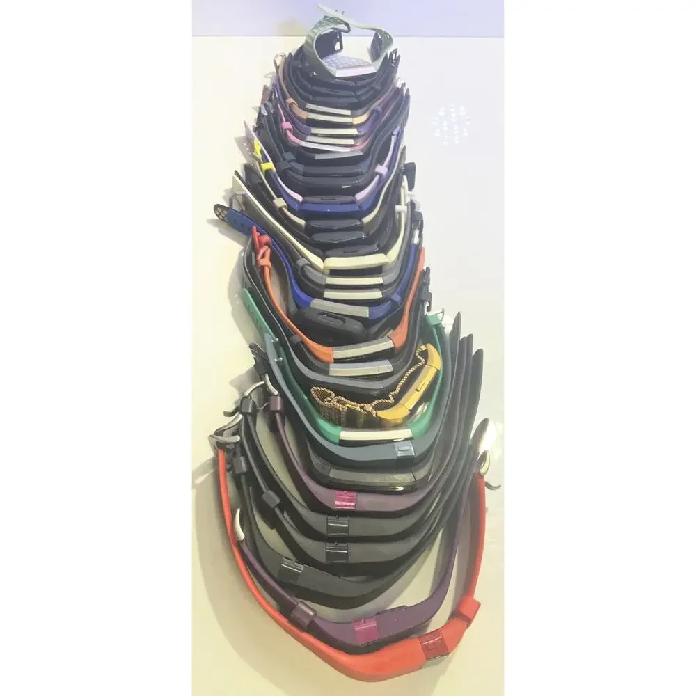 LOT OF 100 + Fitbit Watches Versa Charge Inspire Sense FOR PARTS and REPAIR